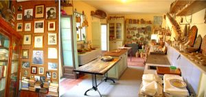 La parete con le foto dei soci fondatori della Società Storica Catanese e la cucina di fine Ottocento