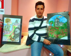 Il pittore Damiano Marra con i suoi dipinti su Calatabiano